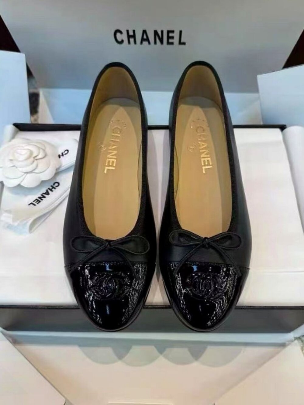 CHANEL Black Patent Cap Toe CC Bow Ballet Flats